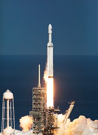 A SpaceX Falcon Heavy rocket begins its demonstration flight with liftoff from Launch Complex 39A at NASA's Kennedy Space Center in Florida. Original from NASA . Digitally enhanced by rawpixel.