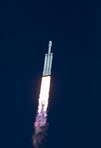 A SpaceX Falcon Heavy rocket begins its demonstration flight with liftoff from from Launch Complex 39A at NASA's Kennedy Space Center in Florida. Original from NASA. Digitally enhanced by rawpixel.