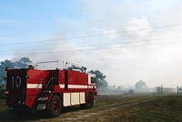 NASA Fire Rescue Services are on the scene to support a controlled burn in the vicinity of the Industrial Area at NASA&#39;s Kennedy Space Center in Florida. Original from NASA . Digitally enhanced by rawpixel.