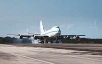 The Shuttle Carrier Aircraft, or SCA, touches down on the runway at NASA Kennedy Space Center&rsquo;s Shuttle Landing Facility in Florida. Original from NASA . Digitally enhanced by rawpixel.