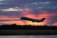 NASA&#39;s C-9 aircraft takes off ahead of the space shuttle Endeavour, mounted atop NASA&#39;s Shuttle Carrier Aircraft or SCA at Shuttle Landing Facility at NASA&#39;s Kennedy Space Center in Florida. Original from NASA . Digitally enhanced by rawpixel.