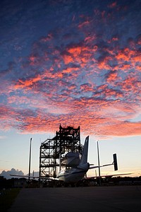 The clouds take on a rosy glow as the sun rises over the Shuttle Landing Facility at NASA&#39;s Kennedy Space Center in Florida. Original from NASA. Digitally enhanced by rawpixel.