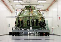 The Orion Exploration Flight Test 1 crew module is undergoing proof pressure testing at the Operations and Checkout Building at NASA&#39;s Kennedy Space Center in Florida. Original from NASA . Digitally enhanced by rawpixel.
