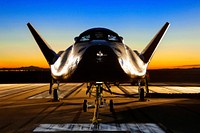 The Sierra Nevada Corporation, or SNC, Dream Chaser flight vehicle is prepared for 60 mile per hour tow tests on taxi and runways at NASA&#39;s Dryden Flight Research Center at Edwards Air Force Base in California. Aug 2nd, 2013. Original from NASA . Digitally enhanced by rawpixel.