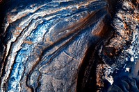 Over 300 meters of layered beds are exposed in this trough of Noctis Labyrinthus. Original from NASA. Digitally enhanced by rawpixel.