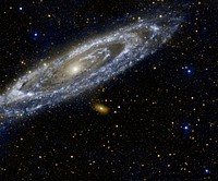 Approximately 2.5 million light-years away, the Andromeda galaxy, or M31, is our Milky Way&#39;s largest galactic neighbor. Original from NASA. Digitally enhanced by rawpixel.