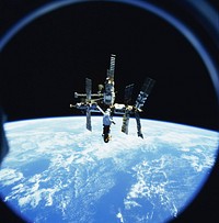 Russia&#39;s Mir space station is backdropped against Earth&#39;s horizon. Original from NASA. Digitally enhanced by rawpixel.