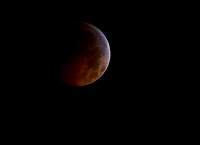 A total lunar eclipse is seen as the full moon is shadowed by the Earth on the arrival of the winter solstice, December 21, 2010 in Arlington, VA. Original from NASA. Digitally enhanced by rawpixel.