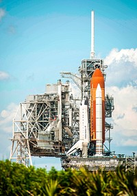Space shuttle Endeavour glistens in the sun on Launch Pad 39A at NASA&#39;s Kennedy Space Center in Florida. Original from NASA . Digitally enhanced by rawpixel.