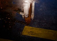 The space shuttle Atlantis is seen shortly after the rotating service structure (RSS) was rolled back at launch pad 39a, Thursday, July 7, 2011 at the NASA Kennedy Space Center in Cape Canaveral, Fla. Original from NASA. Digitally enhanced by rawpixel