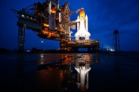 The space shuttle Atlantis is seen shortly after the rotating service structure (RSS) was rolled back at launch pad 39a, Thursday, July 7, 2011 at the NASA Kennedy Space Center in Cape Canaveral, Fla. Original from NASA. Digitally enhanced by rawpixel