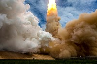The exhaust plume from space shuttle Atlantis is seen as it launches from pad 39A on Friday, July 8, 2011, at NASA's Kennedy Space Center in Cape Canaveral, Fla. Original from NASA. Digitally enhanced by rawpixel