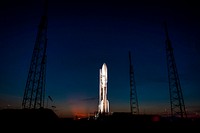 An Atlas V rocket with NASA&#39;s Juno spacecraft payload is seen the evening before it&#39;s planned launch at Space Launch Complex 41 of the Cape Canaveral Air Force Station in Florida on Thursday, August 4, 2011. Original from NASA . Digitally enhanced by rawpixel.