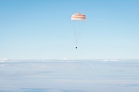 The Soyuz TMA-21 spacecraft is seen as it lands with Expedition 28 in a remote area outside of the town of Zhezkazgan, Kazakhstan, Sept. 16, 2011. Original from NASA . Digitally enhanced by rawpixel.
