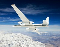 An ER-2 high-altitude Earth science aircraft banks away during a flight over the southern Sierra Nevada. Original from NASA . Digitally enhanced by rawpixel.