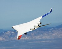 The X-48B Blended Wing Body research aircraft banks smartly in this Block 2 flight phase image. April 4, 2008. Original from NASA . Digitally enhanced by rawpixel.