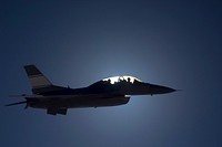 The U.S. Air Force's F-16D Automatic Collision Avoidance Technology (ACAT) aircraft eclipsed the sun during a flight, 2009-03-29. Original from NASA . Digitally enhanced by rawpixel.
