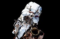 NASA astronaut Garrett Reisman during EVA 1. Original from NASA. Digitally enhanced by rawpixel.