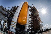 The space shuttle Atlantis on Launch Pad 39A is at the Kennedy Space Center on Tuesday, May 31, 2011, in Florida. Original from NASA. Digitally enhanced by rawpixel