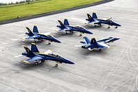 The U.S. Navy&#39;s F/A-18 Blue Angels begin taxiing toward the runway at the Shuttle Landing Facility at NASA&#39;s Kennedy Space Center in Florida. Original from NASA . Digitally enhanced by rawpixel.