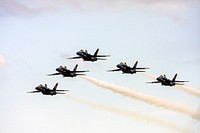 The U.S. Navy&#39;s Blue Angels perform their tight maneuvers over NASA&#39;s Kennedy Space Center in Florida during the Kennedy Space Center Visitor Complex Space and Air Show. Original from NASA. Digitally enhanced by rawpixel.