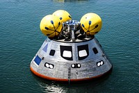 The mockup Orion crew exploration vehicle floats in the water at the Trident Basin at Port Canaveral, Fla. Apr 8th, 2009. Original from NASA. Digitally enhanced by rawpixel.