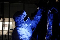 At the Astrotech facility in Titusville, Fla., technicians perform backlight inspection and cleaning on NASA's Lunar Reconnaissance Orbiter, or LRO. Original from NASA. Digitally enhanced by rawpixel.