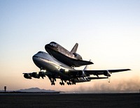 EDWARDS AIR FORCE BASE, Calif. &ndash; ED09-0253-108) Space shuttle Discovery and its modified 747 carrier aircraft lift off from Edwards Air Force Base early in the morning, Sept 20th, 2009. Original from NASA . Digitally enhanced by rawpixel.