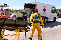 Volunteers portraying astronauts are transported to ambulances as part of a Mode II-IV evacuation simulation exercise at NASA Kennedy Space Center&#39;s Launch Pad 39A, which conducted by The Space Shuttle Program and U.S. Air Force. Original from NASA. Digitally enhanced by rawpixel.