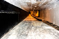 A tunnel beneath Launch Pad 39B at NASA's Kennedy Space Center in Florida leads to the blast-resistant rubber room. Original from NASA . Digitally enhanced by rawpixel.