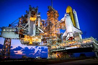 Space shuttle Discovery stands tall on Launch Pad 39A as the sun sets over NASA&#39;s Kennedy Space Center in Florida. Original from NASA . Digitally enhanced by rawpixel.