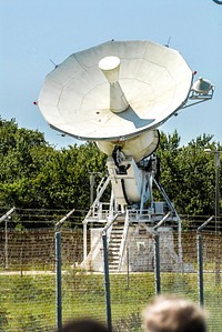 One of two signature 30-foot steerable S-band antennas is slewed from the horizontal to the vertical position for the last time during a closing ceremony recognizing the station's 45 years of service. Original from NASA. Digitally enhanced by rawpixel.