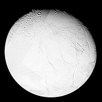 A variety of surface ages is revealed in this 16-image mosaic taken during Cassini's first close flyby of Enceladus, on Feb. 17, 2005. Original from NASA. Digitally enhanced by rawpixel.
