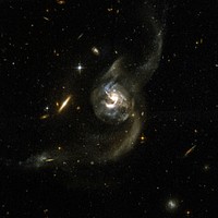 NGC 6090 is a beautiful pair of spiral galaxies. Original from NASA. Digitally enhanced by rawpixel.