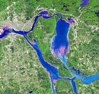 Marie is the name of two cities on Saint Mary's River, separating Canada and the State of Michigan in the United States. Original from NASA. Digitally enhanced by rawpixel.