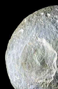 Subtle color differences on Saturn&#39;s moon Mimas are apparent in this false-color view of Herschel Crater. Original from NASA. Digitally enhanced by rawpixel.