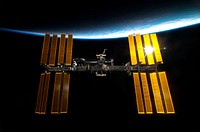 The International Space Station backdropped by Earth&rsquo;s horizon and the blackness of space. Original from NASA . Digitally enhanced by rawpixel.