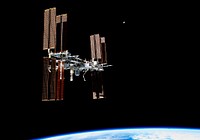 This picture of the International Space Station was photographed from the space shuttle Atlantis in the early hours of July 19, 2011. Original from NASA. Digitally enhanced by rawpixel.