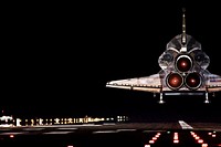 Space shuttle Endeavour lands in darkness on Runway 15 at the Shuttle Landing Facility at NASA&#39;s Kennedy Space Center in Florida after 14 days in space, completing the 5.7-million-mile STS-130 mission to the International Space Station on orbit 217. Original from NASA . Digitally enhanced by rawpixel.