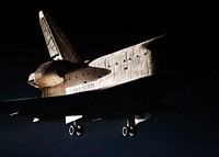 With landing gear down, space shuttle Endeavour nears touchdown on Runway 15 at the Shuttle Landing Facility at NASA&#39;s Kennedy Space Center in Florida after 14 days in space, completing the 5.7-million-mile STS-130 mission on orbit 217 on Feb. 21, 2010. Original from NASA . Digitally enhanced by rawpixel.