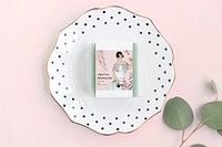 Pastel beauty box mockup psd with woman and cherry blossom, remixed from vintage illustrations published in Très Parisien