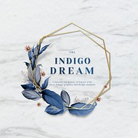 Indigo dream in a gold hexagon frame decorated with blue leaves on a white marble background