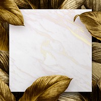 White marble patterned paper on tropical leaves background