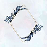 Gold rhombus frame decorated with blue leaves on a white paint brushstroke background