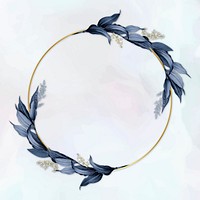 Gold circle frame decorated with blue leaves on a white paint brushstroke background