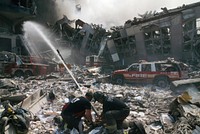 Rescue officers ceasing the fire during the aftermath of the September 11 terrorist attack on the World Trade Center, New York City. Courtesy of the Prints and Photographs Division, Library of Congress. Digitally enhanced by rawpixel.