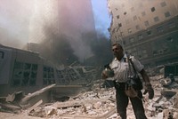 Rescue officer during the aftermath of the September 11 terrorist attack on the World Trade Center, New York City. Courtesy of the Prints and Photographs Division, Library of Congress. Digitally enhanced by rawpixel.