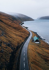 Scenic freeway by the lake in Faroe Islands