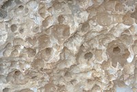 Beige rock textured surface background