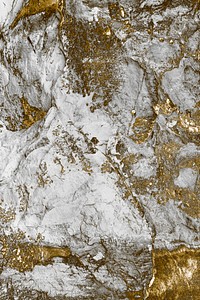 Gray seaside rock with gold glitter texture background